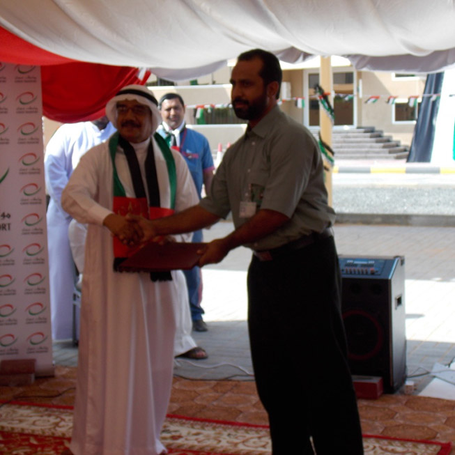 Our driver Mr. Hasham Khan receiving appreciation certificate