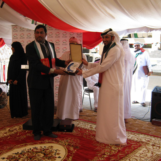 Gift Memento with Arabia Taxi Logo to the Administration & Finance Manager Mr. Omar Lootah.
