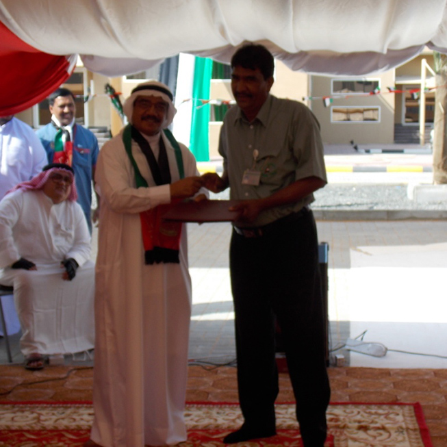 Our driver Mr. Ilyas Masih receiving appreciation certificate